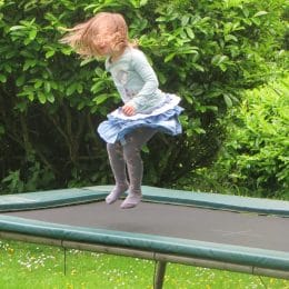 a girl bouncing on one of the best rectangular trampolines